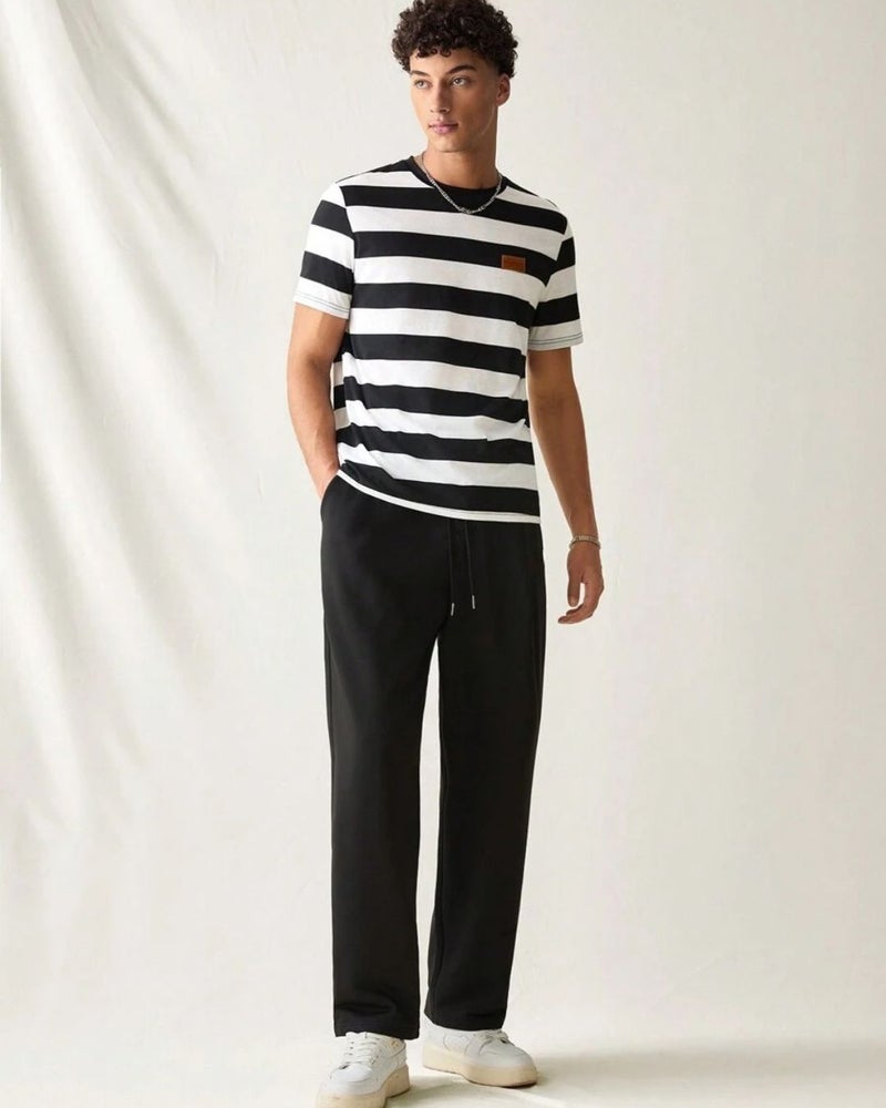 فلاينوف بنطلون رياضي كوري أسود برباط بقصة فضفاضة - Image 1